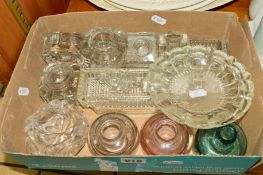 A BOX OF GLASS INKWELLS, locking covers, together with a small quantity of press moulded glass