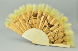 AN EARLY 20TH CENTURY SILK, BONE AND FEATHER FAN DESIGNED BY J.H. ALLCHIN, the gold coloured silk