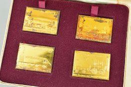 A BOXED AND CASED SET OF SILVER GILT 'PASSENGER RAILWAY 150TH ANNIVERSARY 1825 - 1975' STAMP