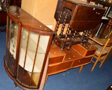 AN OAK BARLEY TWIST DROP LEAF DINING TABLE, together with a mahogany china cabinet and a teak