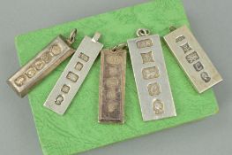 FIVE SILVER INGOT PENDANTS, all of rectangular outline with large hallmarks to the front of each,