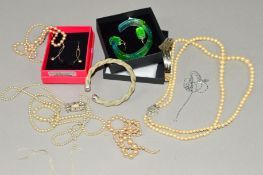 A SELECTION OF JEWELLERY to include a Mexican Alpaca torque bangle, imitation pearl necklaces, a