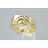 A GENTLEMAN'S DIAMOND SET YELLOW METAL RING, of a signet ring design with a pierced snake like panel