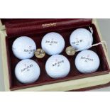 GOLFING INTEREST:- A PAIR OF ELIZABETH II SILVER GOLF TEES and six 'Top Flight' golf balls in a 'TOP