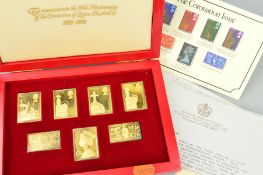 A CASED SET OF SEVEN SILVER GILT STAMP MEDALLIONS 'To Commemorate the 25th Anniversary of the