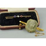 TWO EARLY 20TH CENTURY BROOCHES to include a 9ct gold bar brooch set with a sapphire, diamond and