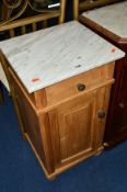 AN EDWARDIAN PINE MARBLE TOPPED POT CUPBOARD with a single drawer