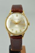 A LEGION WRISTWATCH, the circular dial with Arabic numeral hour markers and brown leather strap,