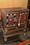 A 20TH CENTURY ORIENTAL HARDWOOD TWO DOOR TABLE TOP CABINET, with two pierced detail doors, with