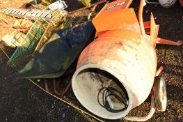 A BELLE MINI CEMENT MIXER, a galvanised steel wheelbarrow and a steel trolley with side supports,