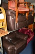 A BROWN LEATHER ELECTRIC RECINER TWO PIECE LOUNGE SUITE comprising of a two seater settee and an