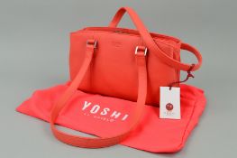 A YOSHI (LICHFIELD) CORAL HANDBAG