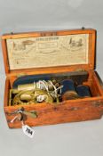 A CASED VICTORIAN MEDICAL 'IMPROVED MAGNETIC ELECTRIC MACHINE' missing lock, some damage to wooden