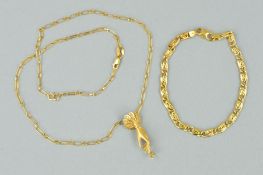A CHAIN PENDANT NECKLACE AND A BRACELET, the pendant designed as a hand suspending a small cubic