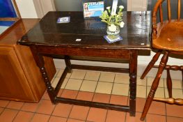 A GEORGIAN OAK SIDE TABLE on bobbin turned supports united by four stretchers, approximate width