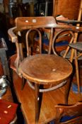 A 20TH CENTURY OAK BENTWOOD ELBOW CHAIR