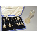 A CASED SET OF SIX GEORGE V SILVER COFFEE SPOONS AND MATCHING SUGAR TONGS, makers Cooper