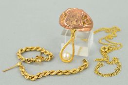 THREE ITEMS OF JEWELLERY comprising an early 20th Century 9ct gold signet ring, the shield shape