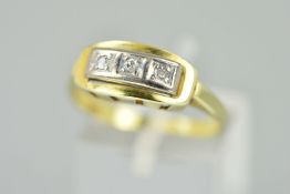 A THREE STONE DIAMOND RING designed as three single cut diamonds set to a rectangular panel atop a