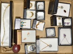 A SELECTION OF GEM JEWELLERY to include topaz pendants, earrings, rings and a bracelet, a matching