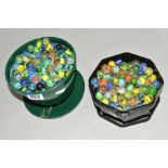 TWO PLASTIC TUBS OF GLASS MARBLES