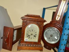 AN OAK CASED BRACKET CLOCK with a Junghans movement, approximate height 36cm (two keys and