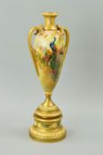 A ROYAL WORCESTER TWIN HANDLED VASE, hand painted Peacock and Hen, signed Sedgley, gilt decorated