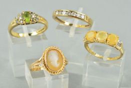 FOUR 9CT GOLD RINGS to include a cubic zirconia half eternity ring, ring size P, a cameo ring,