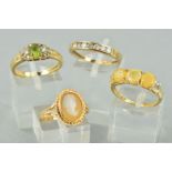 FOUR 9CT GOLD RINGS to include a cubic zirconia half eternity ring, ring size P, a cameo ring,