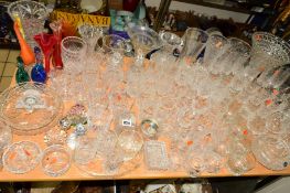 A QUANTITY OF GLASSWARE, including vases, drinking glasses, coloured glass birds, paperweights etc