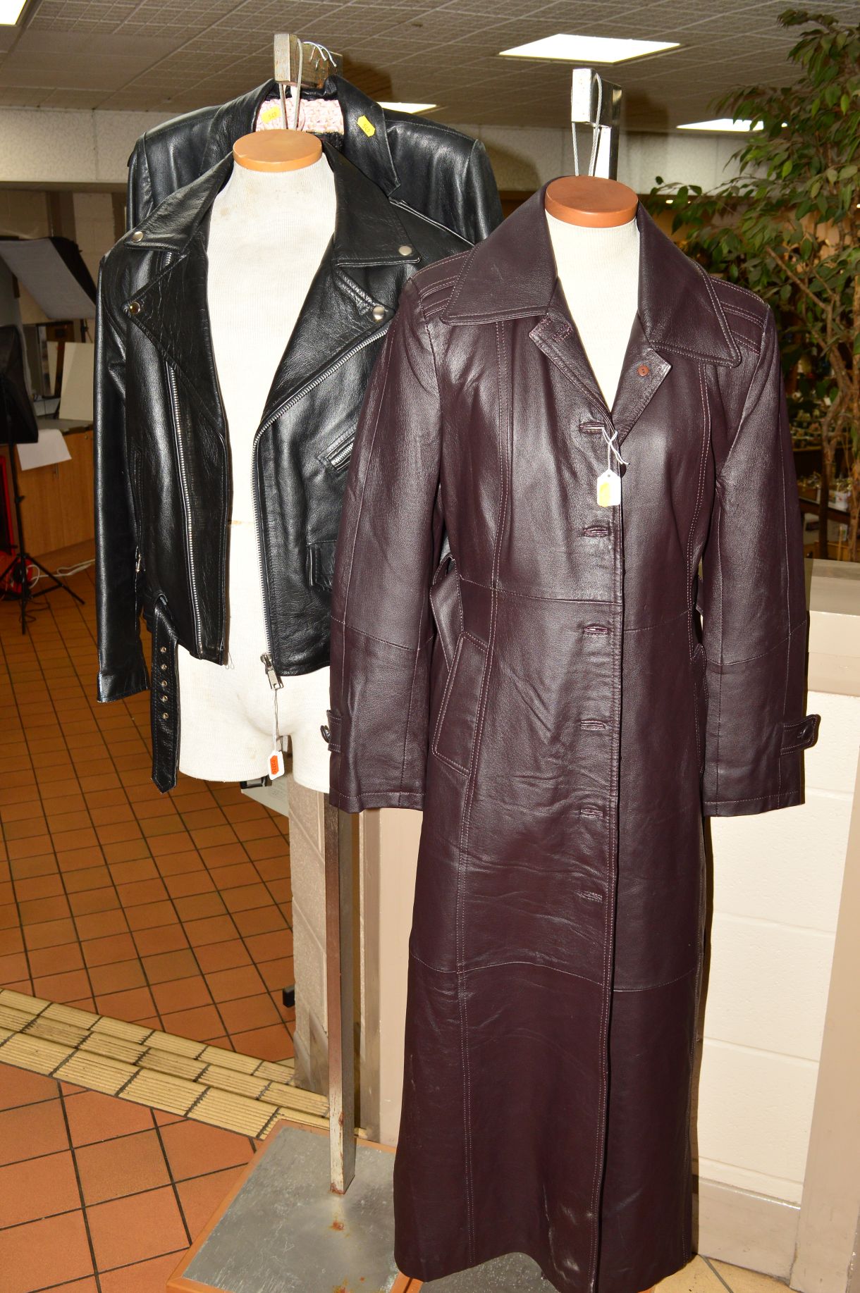A GENT'S SHORT LEATHER JACKET, size 40, a ladies leather jacket, size 12 and another ladies