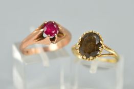 TWO GEM SET RINGS, the first a 9ct gold ring claw set with an oval smokey quartz, hallmarked, ring