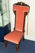 A VICTORIAN WALNUT PRAYER CHAIR, covered with velour upholstery