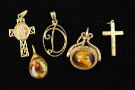 FIVE PENDANTS to include a cross pendant, an openwork initial D pendant, a scrolling cross pendant