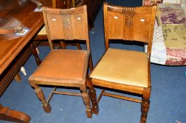 A SET OF SIX OAK DINING CHAIRS