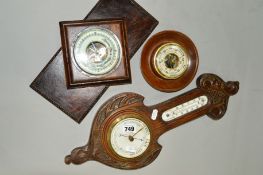 THREE WOODEN FRAMED ANEROID BAROMETERS, one inset with a mercury thermometer, approximate height