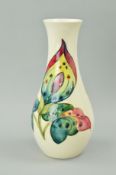 A MOORCROFT POTTERY VASE, 'Arum Lily' pattern on cream ground, impressed backstamp and painted