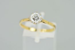 A 9CT GOLD CUBIC ZIRCONIA SINGLE STONE RING, designed as a circular claw set cubic zirconia to the