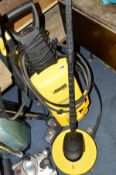 A KARCHER K3.99 PRESSURE WASHER with two attachments