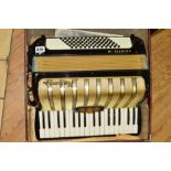 A CASED HOHNER ARIETTA IM ACCORDIAN