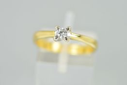 A DIAMOND SINGLE STONE RING, designed as a brilliant cut diamond within a four claw setting to the