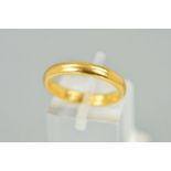 A 22CT GOLD BAND RING, designed as a plain band, hallmarked Birmingham 1957, width 3mm, weight 4.6