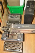 AN IMPERIAL MANUAL TYPEWRITER, with a cased Imperial Model T manual typewriter and a quantity of