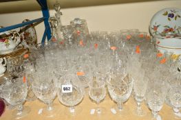 A QUANTITY OF CUT GLASS etc to include decanters, vases, bowls and drinking glasses etc (over 90