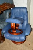 A BLUE LEATHER OFFICE SWIVEL ARMCHAIR on a circular oak base with matching footstool (2)