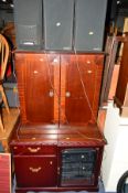 A MODERN MAHOGANY HI-FI CABINET containing a Kenwood component hi-fi and four various speakers, a
