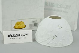 A LIGHT GLOW TEALIGHT CANDLE HOLDER