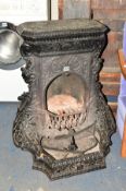 A VICTORIAN PAINTED CAST IRON FIRE PLACE with foliate detail