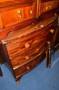 A GEORGIAN MAHOGANY AND INLAID BOW FRONT CHEST of three long drawers, with turned bracket feet,