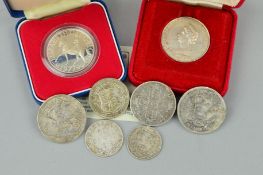 EIGHT COINS to include a cased Elizabeth II 1977 proof coin to commemorate the Queen's Silver